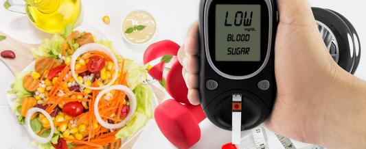 Fresh vegetables and a blood glucose monitor on a kitchen counter representing diabetes-friendly living