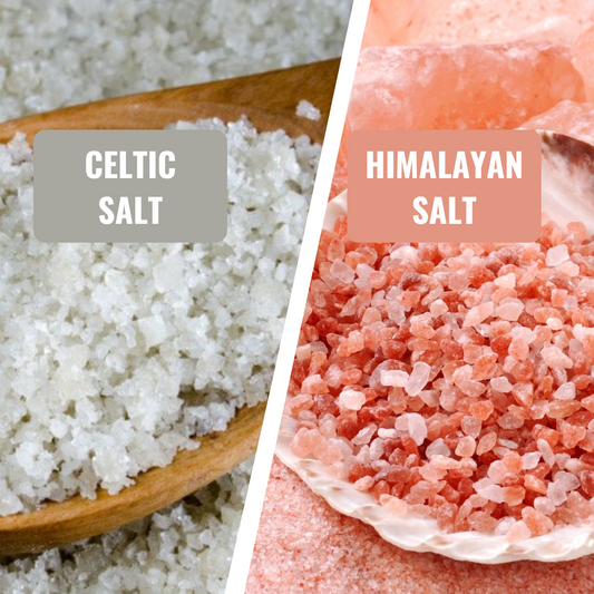 Himalayan pink salt crystals and Celtic sea salt side by side on a wooden surface