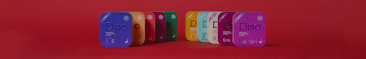 Diso dissolvable vitamin strips displayed next to their packaging on a clean surface