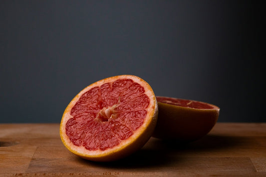 21-day parasite cleanse guide with natural supplements and fresh whole foods on a table
