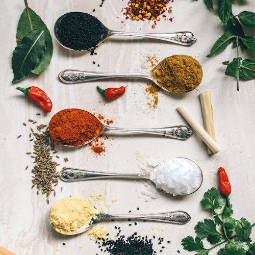 Selection of natural spices, salts, and pepper products available at Onelife Health
